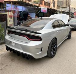 دۆج چارجەر